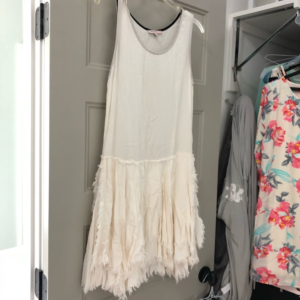 Boutique, Trendy White Frayed ruffle bottom dress